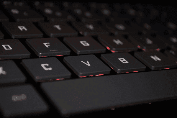 Technical workspace and keyboard suggesting measurement systems, tracking infrastructure and performance analysis