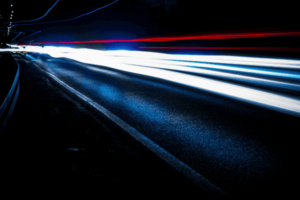 Website Performance and Speed Light Trails Light trails on a road representing fast website performance and content delivery speed